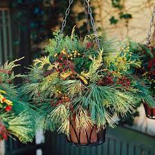 Holiday Inspired Outdoor Decorating That Lasts Christmas Hanging Baskets Christmas Decorations Outdoor Christmas Decorations