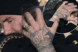 David and victoria beckham, the nicest tattooed couple in the world! David Beckham Victoria Tattoo Spelled Wrong
