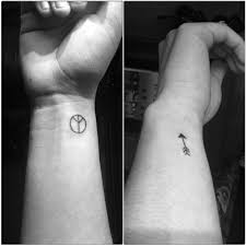 The color white symbolizes the privates who never fight, but who do women's work in the prisons. Peace Sign Birthday Quotes Men Wrist Cover Up With Custom Made Peace Sign And Arrow Tattoo Dogtrainingobedienceschool Com