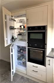 Integrated Fridge Freezer 50 50 Split Neff Combi Oven And A Neff Single Oven Integrated Fridge Kitchen Design Small Kitchen Remodel Layout