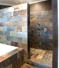 David dietrich photography mountain style slate tile bathroom photo in other whoa, love the rock, yet not the waterfall shower.unless we made it the dispense to the bathtub.could be part of the half wall between the toilet and the tub? Walk In Shower Ideas Not Tile Novocom Top