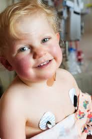 My Ellie showed a brave face after her surgery today. A little scared but  doing great, mom