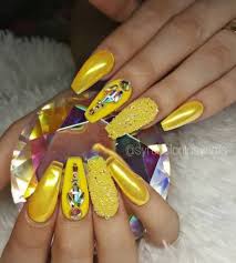 Hand with long artificial manicured nails colored with yellow nail polish. 48 Ideas For Nails Design With Rhinestones Yellow Coffin Nails Designs Nails Design With Rhinestones Yellow Nails Design