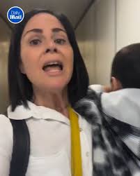 She was kicked off the flight with her...