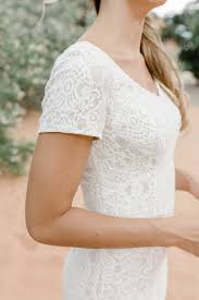 With lace gowns, dresses with sleeves, tulle ballgowns, and plunging necklines, our latest collection features some of the biggest fashion trends for spring and summer weddings. Tr12024 Modest Lace Wedding Dress Short Sleeve A Closet Full Of Dresses