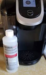 Add citric acid pellets for cleaning limescale. White Vinegar Vs Keurig Descaling Solution The How To Home