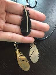 Calamity salvager (the aftcastle)/gold chocobo feather exchange: Final Fantasy Chocobo Necklace Chocobo Key Feather Key Chain Etsy In 2021 Feather Necklaces Sale Necklace Leather Necklace