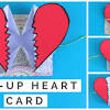 Cut around the heart on the solid line, leaving the unmarked edge of the heart uncut. 1