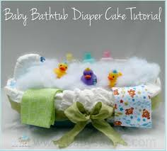 The fosset is a wire hanger base covered with baby wash clothes. Unique Baby Shower Gift Wrapping Ideas