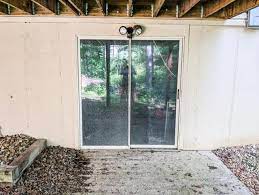 Feb 02, 2010 · lay the frame down on the ground in front of the opening and apply lots of silicone caulk at the bottom of the frame as well as to the nailing flanges. Replacing Our Basement Patio Door Diy Install Grove House Reno