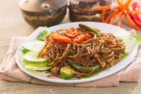 This mee goreng mamak is a uniquely malaysian indian muslim creation of fried noodles with a special sauce and fritters. Mee Goreng Mamak Popular Cusine In Malaysia Stock Photo Picture And Royalty Free Image Image 29215696