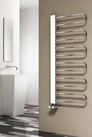 Nearly all the towel rails shown here can have an optional electric element fitted so that warm towels can be available when your heating is turned off. Reina Designer Larino Vertical Chrome Heated Towel Rail Steel Radiator Heated Towel Rail Towel Rail Heated Towel