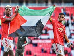 So far, 212 palestinian lives have been lost in the last. Pogba Diallo Hold Up Palestine Flag At Manchester United Match