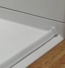 Radius end caps to run the dam up the wall and capped; Collapsible Shower Dams Kr Specialties