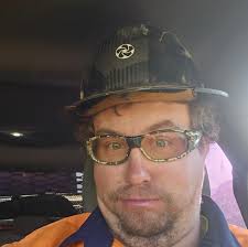 A Bell 407 operated by the Los Angeles Department of Water and Power moves  workers to a power structure in this photo by Skip Robinson. Read more  about LADWP Aviation Services in