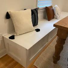 It has two side tabletops that can be lifted up or put down. Kitchen Storage Bench Ryobi Nation Projects