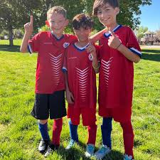 These three boys are soccer phenoms. They made so many goals each game,  they were asked to STOP. Apparently it's no fun to play or watch a game  when one team wins