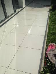 The perforated floor tiles also make the area less slippery, especially in damp or wet locations. Applying Ant Slip To A Shiny Porcelain Patio Patio Stone Cleaning And Maintenance