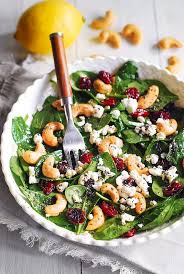 It is important to chill the dressing for a bit after mixing the ingredients together so that they blend with eachother well and mix well right before pouring it on the salad. Cranberry Spinach Salad With Cashews And Goat Cheese Julia S Album