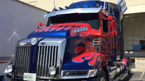 Optimus prime statue at universal. Exclusive Transformed Optimus Prime Rolls Out