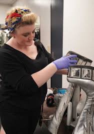 Met the woman who dresses Kiss: Dragon boots and blood-stained armour