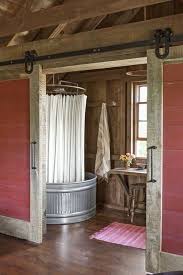 Take An Old Fashioned Shower Inside This Oversize Delaval Watering Trough Repurposed Here With Style Barn Apartment Barn Loft Apartment Barn House Interior