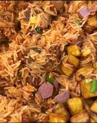 Nigerian jollof rice with beef. How To Cook Nigerian Party Jollof Rice Delishably