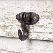 We forge several kinds of wrought iron hooks for whatever you need to hang. Rustic Farmhouse Cast Iron Ceiling Wall Hook
