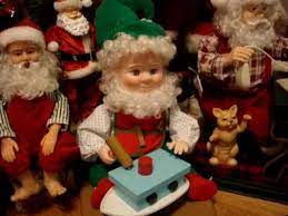 He stands on a red and gold base holding a wreath in one hand and a candy cane in the other, dressed to impress! Rhons Collection Of Animated Christmas Figures As Of December 11 2009 Youtube