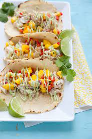 Especially because tomorrow is cinco de mayo! Fish Tacos With Mango Salsa And Avocado Cream Sauce Everyday Annie