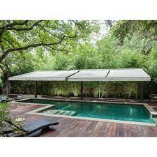 Retractable Drop Arm Awnings For Patios Decks And Pools Texas Sun And Shade Pool Shade Exterior Shades Balcony Remodel
