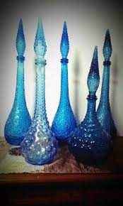 Maybe you would like to learn more about one of these? Blue Genie Bottles Part Of My Genie Bottle Collection Love Love Love Them Vintage Art Glass Blenko Glass Genie Bottle
