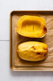 Drizzle the cut side with oil or spread with butter. How To Cook Spaghetti Squash Minimalist Baker Recipes
