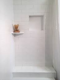 Ultimate guide to subway tile kitchen backsplash design ideas including popular styles, patterns & types. Side Wall Of The 3x6 Subway Tile Pattern We Installed A White Corner Shelf And Schluter 12x12 Bathroom Shower Design White Corner Shelf Corner Bathroom Mirror