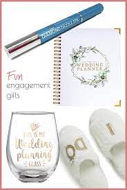 While wedding gifts are easy to figure out thanks to their registry, the engagement phase can be harder. Fun Engagement Gift Ideas For The Bride To Be Georgina Stokes