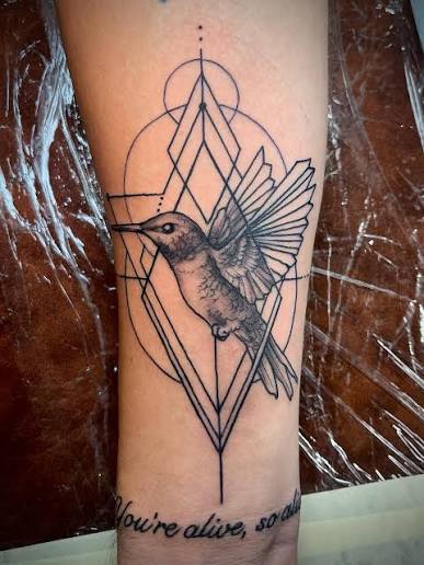 Geometric Hummingbird tattooed by @dustin_hysell_tattooer We are open 7 days a week from 12-8pm! Stop by for a free consultation or a walk-in tattoo. #walkintattoo #columbustattooers #sacredhand Follow our whole team : @