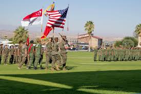 U.S. Marines and Soldiers from the Singapore Armed Forces march off the  colors during the opening ceremony for Exercise Valiant Mark 2018 at Marine  Corps Air-Ground Combat Center Twentynine Palms, California Aug.