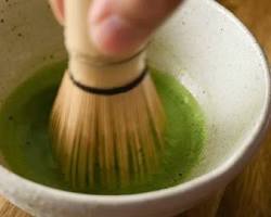 Japanese matcha tea preparation whisking bowl close up aesthetic, do AI tạo