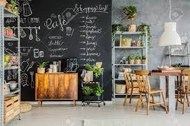 Accent wall area rug armoire artwork baseboard basement bedding bedroom beige roman shade black and white black desk black stools black white. Chalkboard Dining Room Design In Modern Industrial Style Stock Photo Picture And Royalty Free Image Image 85133989