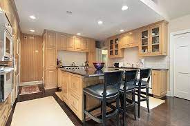 Light wood cabinets with black kitchen countertops. 43 New And Spacious Light Wood Custom Kitchen Designs Light Wood Kitchens Light Wood Cabinets Wood Kitchen