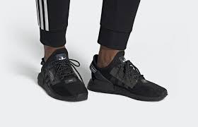 With a modern, unique silhouette that boasted design elements borrowed from some of the most iconic adidas running sneakers of the past, the adidas nmd r1 was a standout model that hit the ground running. Adidas Nmd R1 V2 Core Black Iridescent Fw1961 Fastsole