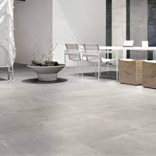 Grey porcelain floor tiles are used to beautify residential and commercial spaces, be it the kitchen backdrop or the exterior walls of the building. Extra Large White Porcelain Floor Tiles Grey Flooring White Tile Floor Tile Floor