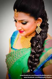 All your hair will be sectioned into squares and worked into individual plaits to get this look. Traditional Southern Indian Bride S Bridal Braid Hair Hairstyle By Vejetha For Swank Studio Photo Credit Mani Hair Styles Braided Hairstyles Fish Tail Braid