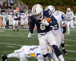 Umpleby sets mark as Warriors drop Cougars, 38-14