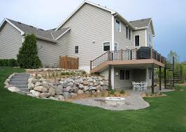 Step down retaining wall ideas. Deck Vs Patio Steps Down From House To Patio Axel Landscape