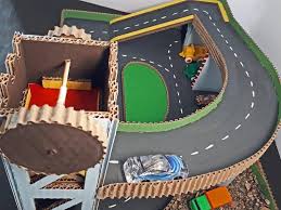 Toy Car Play Mat With Lift And Parking Diy Tutorial Car Play Mats Diy Toys Car Play Mat