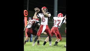 Trojan football team rallies late to trip Lansing Kee