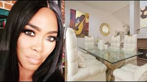 Geometric hexite tiles by fireclay are finished with pale blue grout, which complements the upper cabinets. Kenya Moore California House Tour Before Moving To Atlanta Youtube