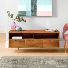 In addition to that, having a tv stand made out of wood, it makes you have the option of matching the layout with the entire house planning, if your home decoration is. Mercury Row Sadie Solid Wood Tv Stand For Tvs Up To 65 Reviews Wayfair