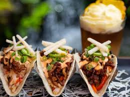 Serve tropical snacks such as macadamia nuts, coconut, and cashews in wooden bowls. Hawaiian Recipes Food Network Food Network